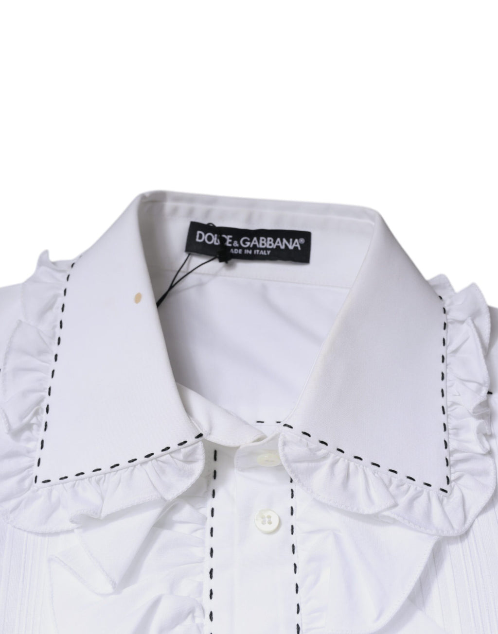 Haut blanc en coton à manches longues Dolce & Gabbana avec col à volants et détails féminins, vue de face.