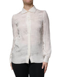 Chemise blanche en soie Dolce & Gabbana à col et manches longues, élégante et sophistiquée, vue sur le haut.