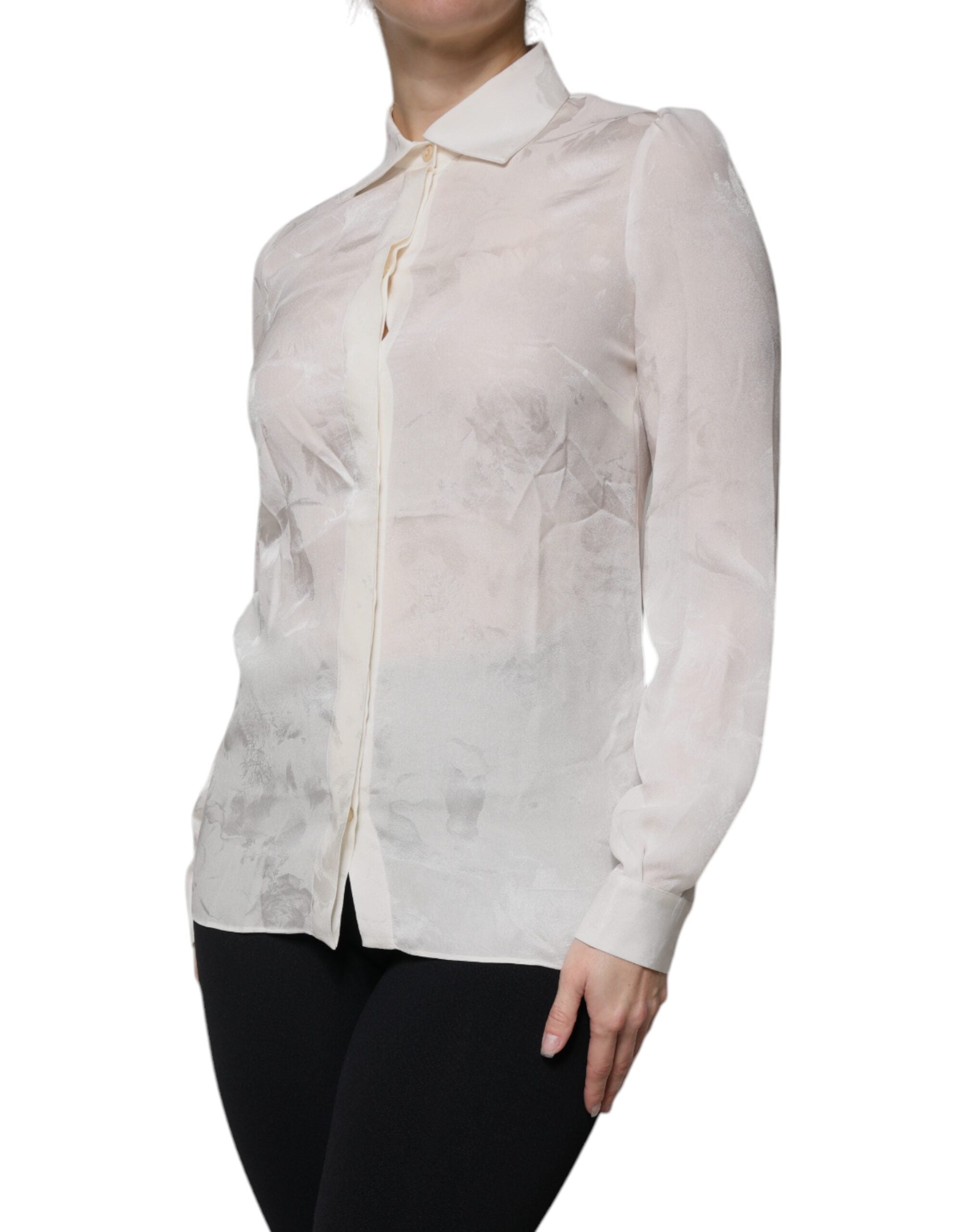Chemise en soie blanche à col et manches longues Dolce & Gabbana, vêtement élégant avec détails sophistiqués visible sur l'image