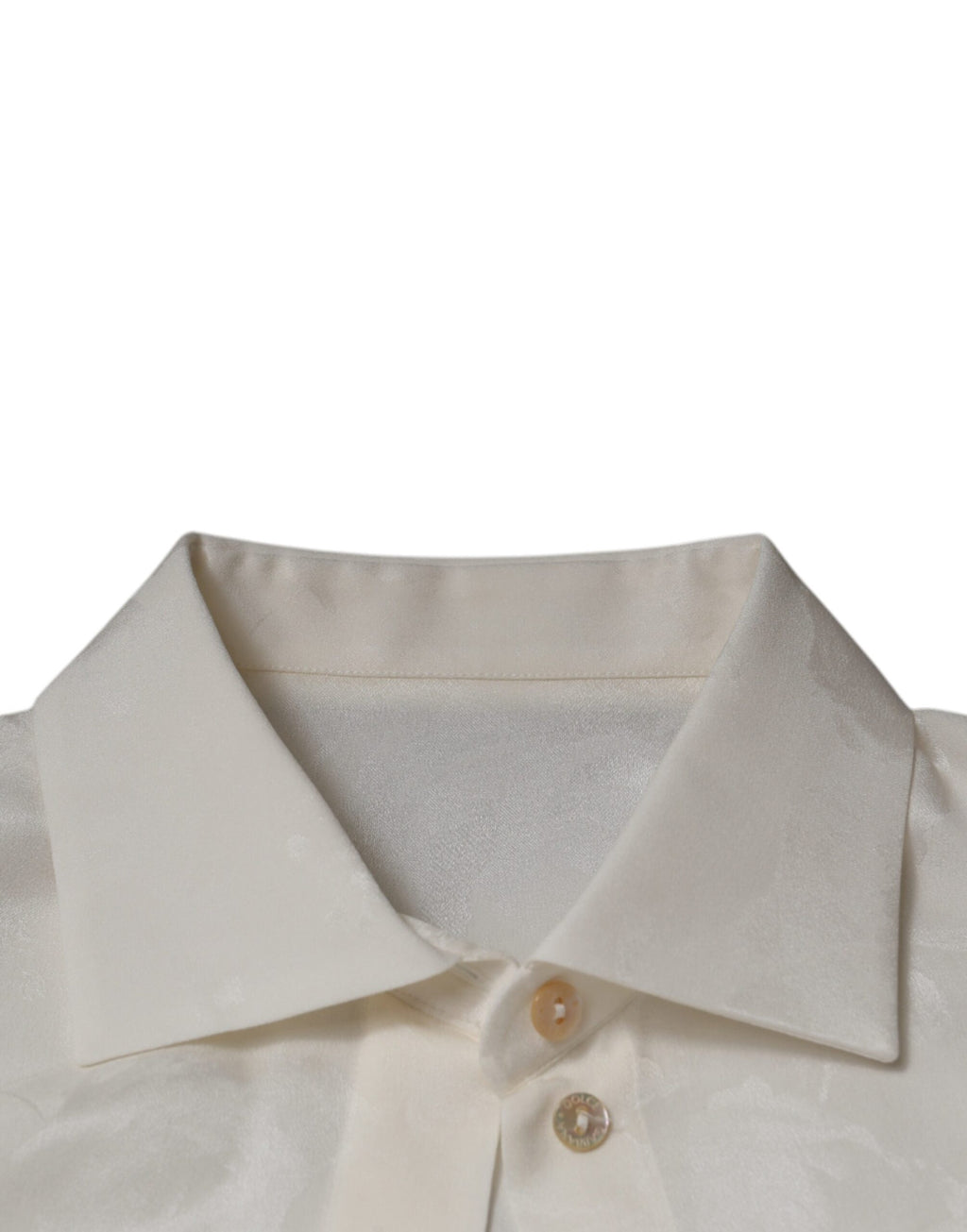 Chemise blanche en soie à col et manches longues de Dolce & Gabbana, élégante et sophistiquée.