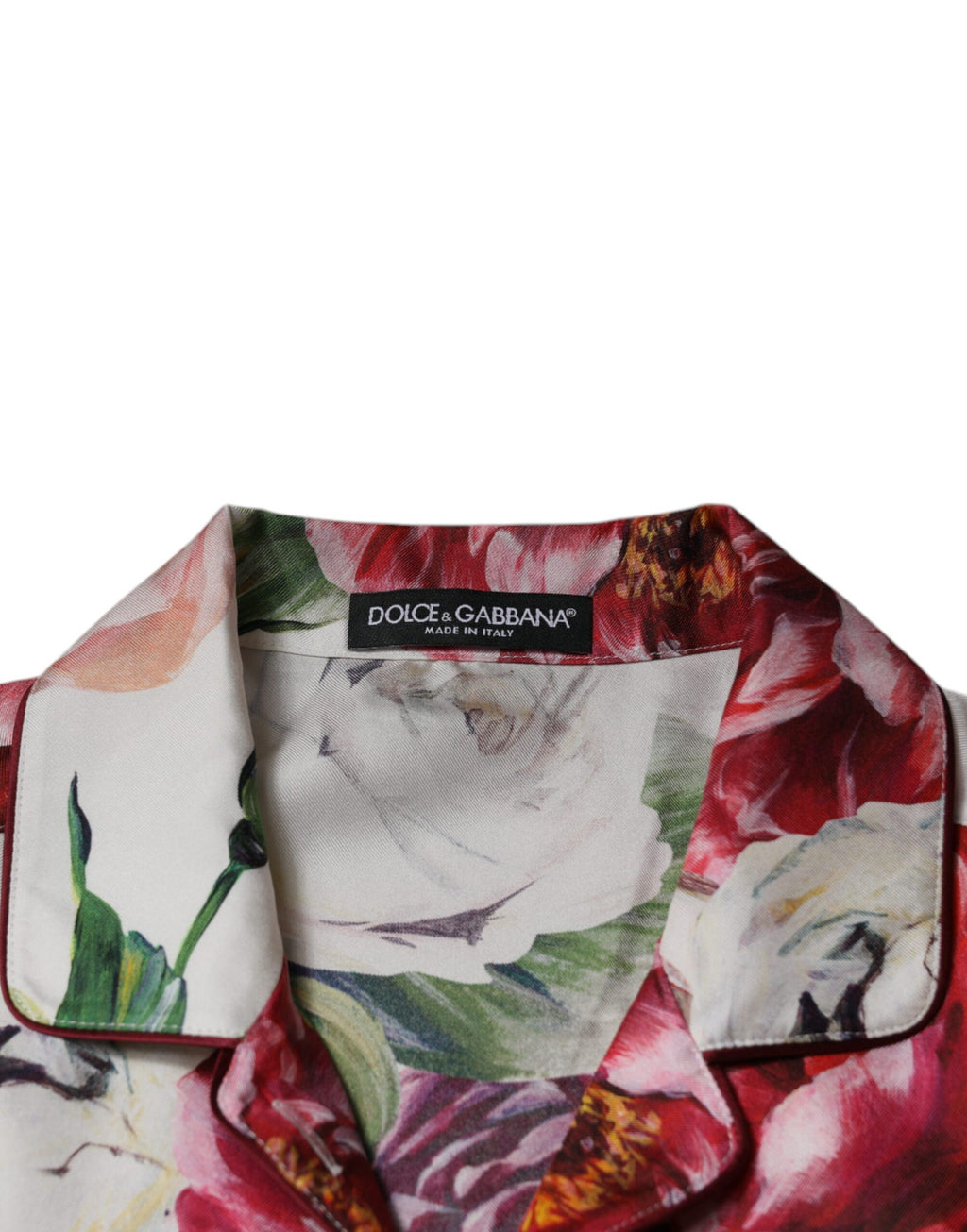 Chemise en soie blanche Dolce & Gabbana à manches longues et col chemise, élégante et fluide, ornée de peonies.