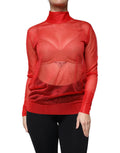 Haut à manches longues en maille rouge Dolce & Gabbana, col roulé élégant, ajusté et texturé visible sur cette blouse.