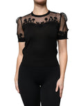 Blouse Dolce & Gabbana en dentelle noire à manches courtes avec motifs floraux, élégante et feminine.