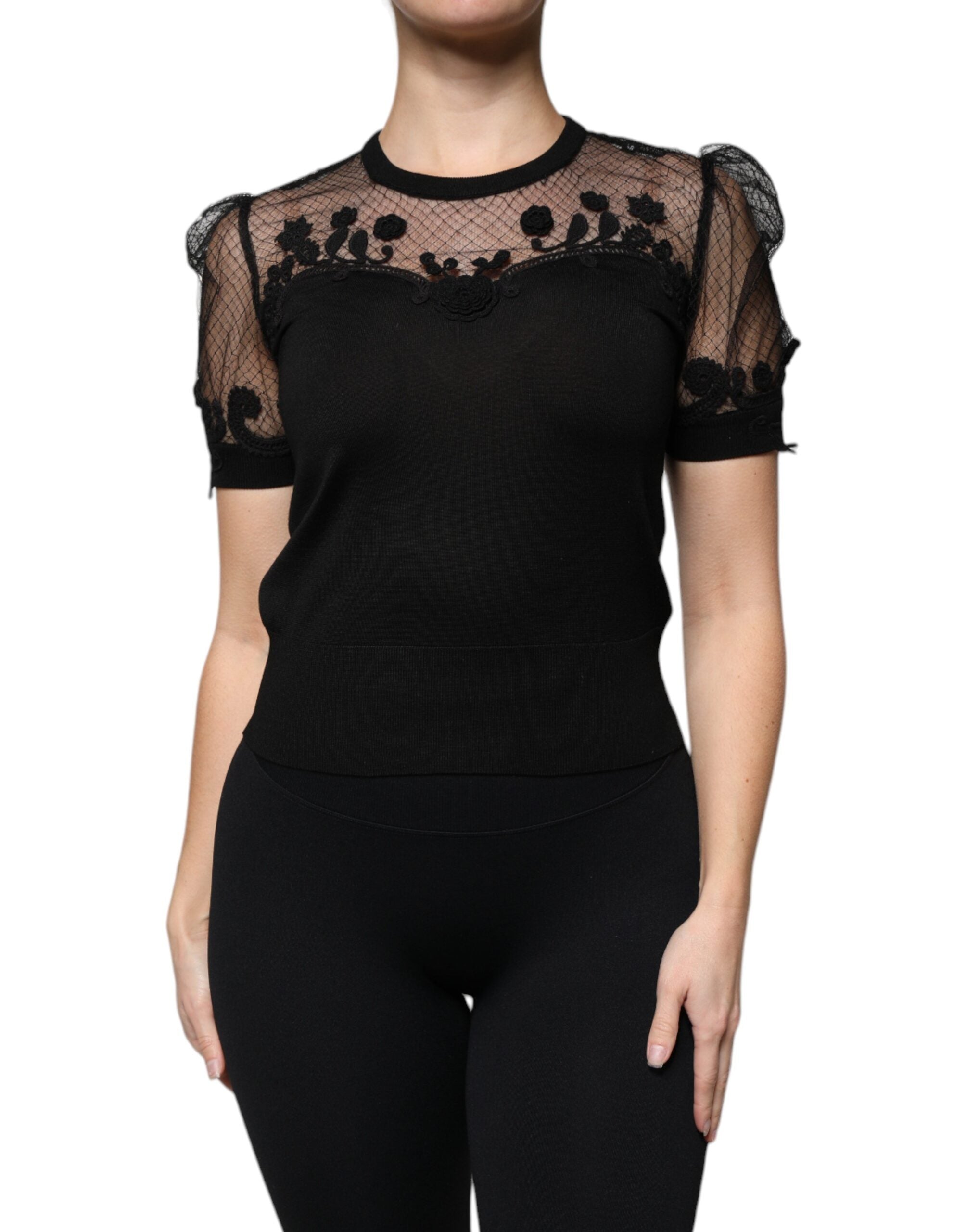 Blouse Dolce & Gabbana en dentelle noire à manches courtes avec motifs floraux, élégante et feminine.