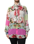 Haut Dolce & Gabbana à col ascot avec patchwork floral multicolore, motif élégant et détails sophistiqués.