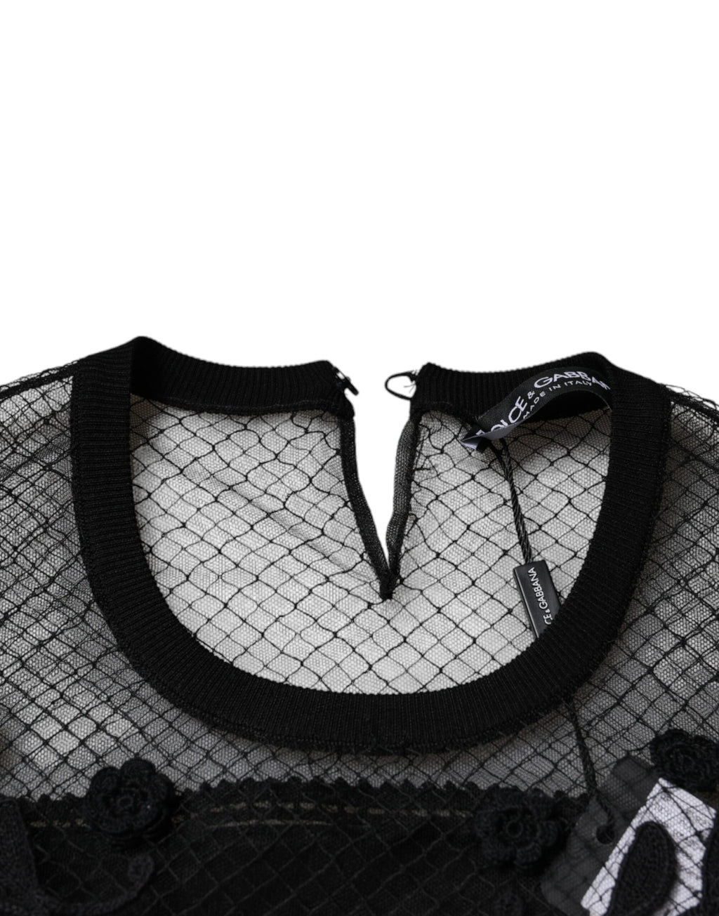 Blouse courte noire Dolce & Gabbana en dentelle florale à manches courtes, élégante et féminine.
