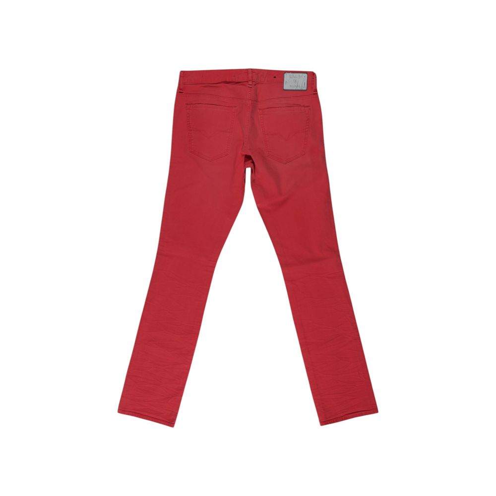 Jeans skinny en coton multicolore de Guess, coupe ajustée, affichés sur un fond neutre.