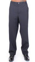 Pantalons plissés en laine noire Dolce & Gabbana, coupe stretch, élégants et modernes, visibles dans cette image.