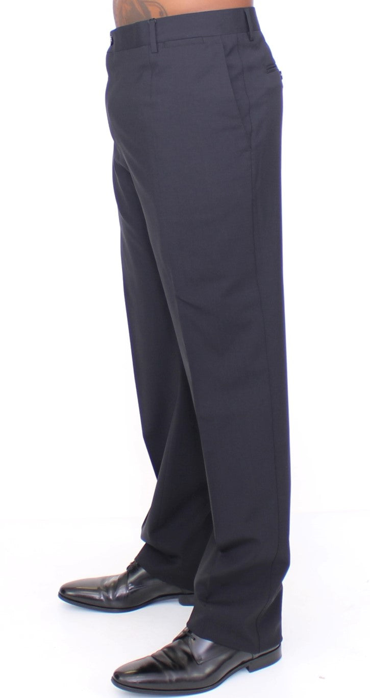 Pantalon plissé en laine noire Dolce & Gabbana, pantalon stretch élégant pour homme ou femme.