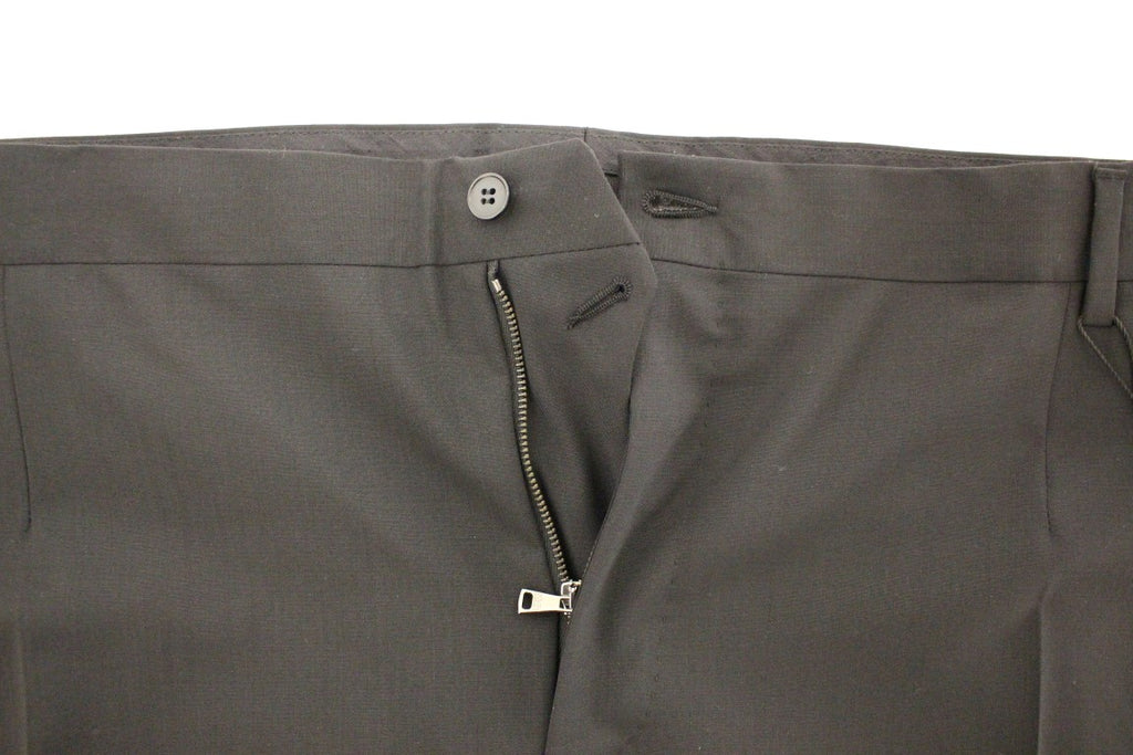 Pantalon plissé en laine stretch noir de Dolce & Gabbana, style élégant et couture italienne.