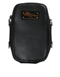 Sac pochette en cuir grainé noir Dolce & Gabbana avec plaque logo élégante, idéal pour une occasion chic.