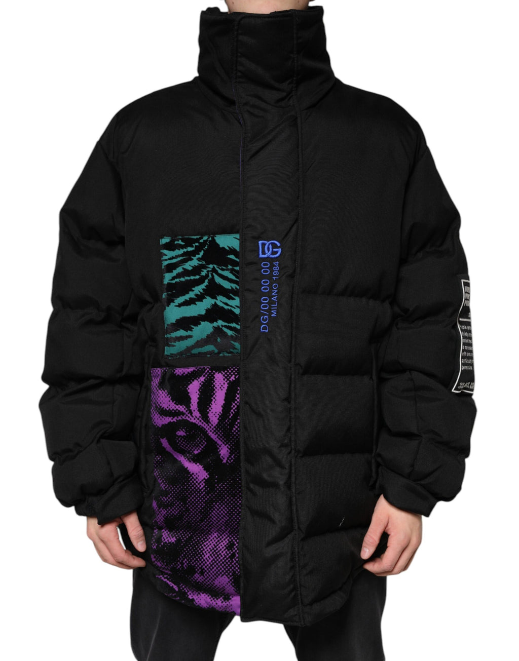 Veste matelassée noire en nylon pour homme Dolce & Gabbana avec fermeture éclair complète, col haut et poches latérales.
