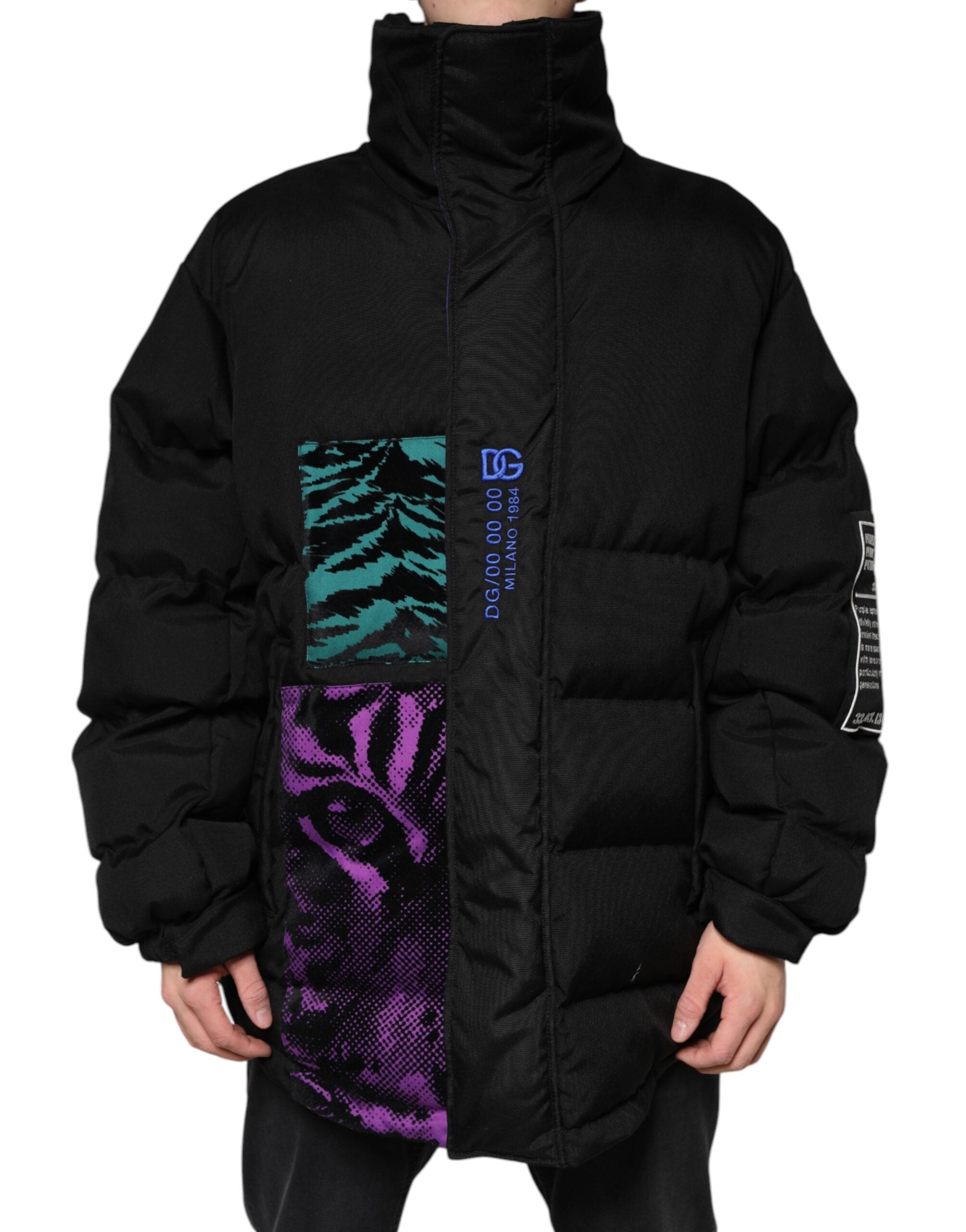 Veste matelassée noire en nylon pour homme Dolce & Gabbana avec fermeture éclair complète, col haut et poches latérales.