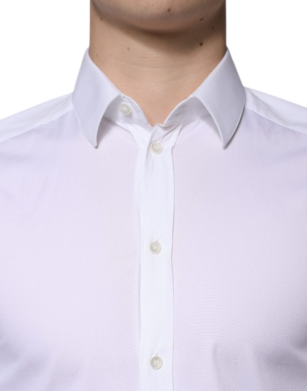 Chemise formelle blanche en coton pour homme Dolce & Gabbana, avec détails dorés, élégante et sophistiquée.