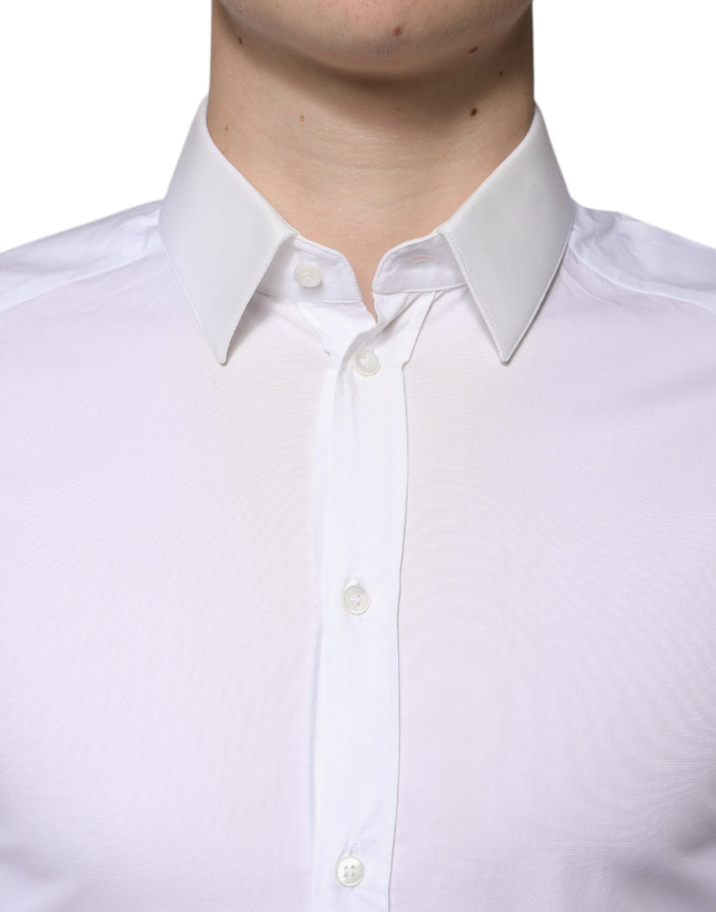 Chemise homme Dolce & Gabbana en coton blanc, costume formel avec boutons dorés, style élégant et sophistiqué.