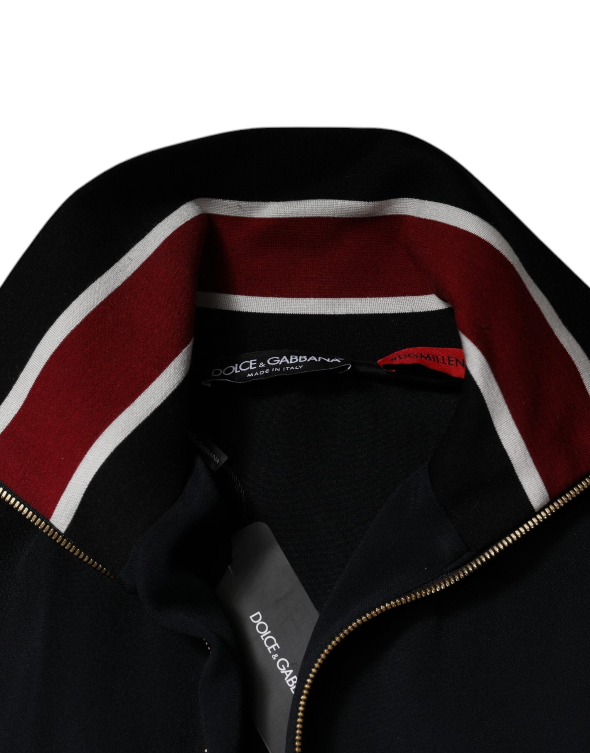 Sweat-shirt Dolce & Gabbana noir avec fermeture éclair complète et logo DG, porté ou posé sur un fond neutre.