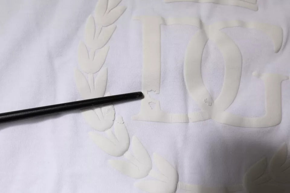 T-shirt blanc en coton Dolce & Gabbana avec logo embossé, col rond et coupe classique.