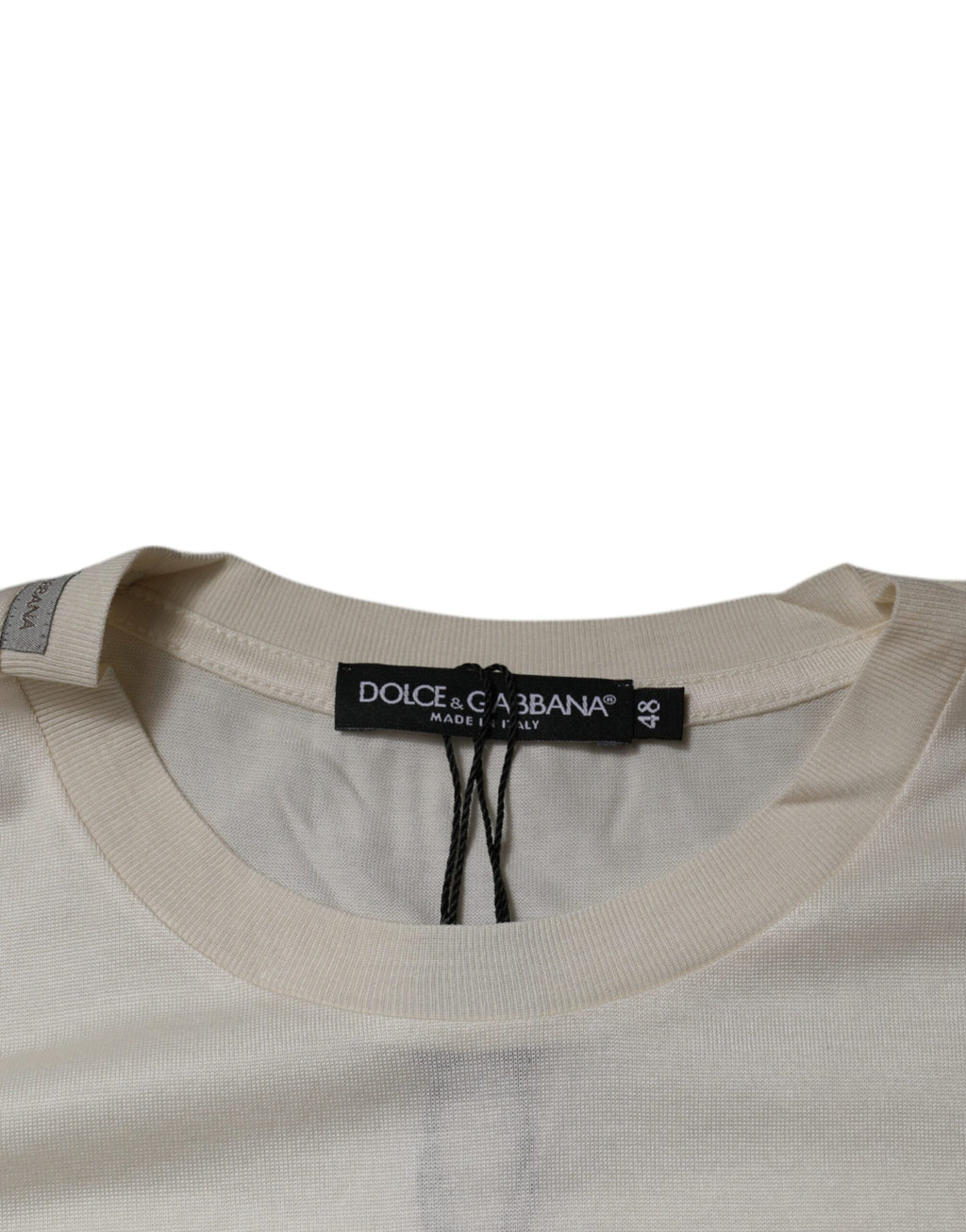 T-shirt Dolce & Gabbana en soie blanche à col rond et manches courtes, vue de face.
