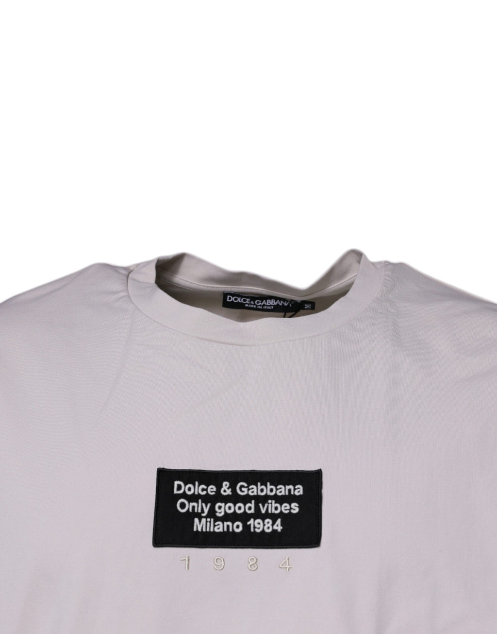 T-shirt beige Dolce & Gabbana à logo DG, col rond à manches courtes, vue de face.