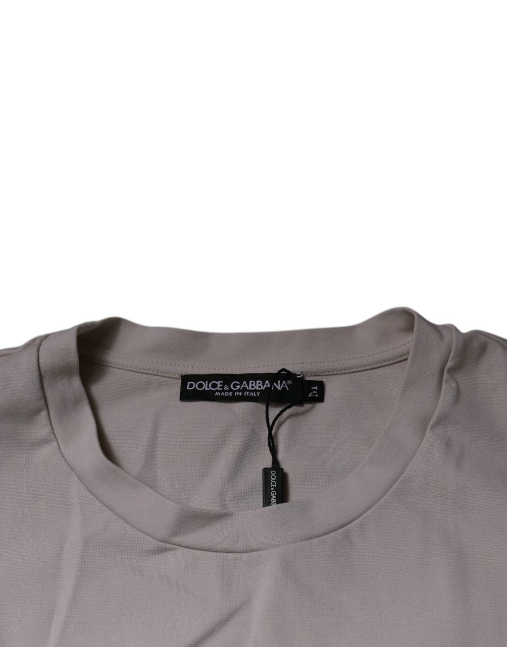 T-shirt beige Dolce & Gabbana avec logo DG, col rond, manches courtes, vue de face.
