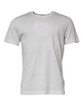 T-shirt blanc Dolce & Gabbana en coton avec logo DG à la poitrine, col rond, vue de face.