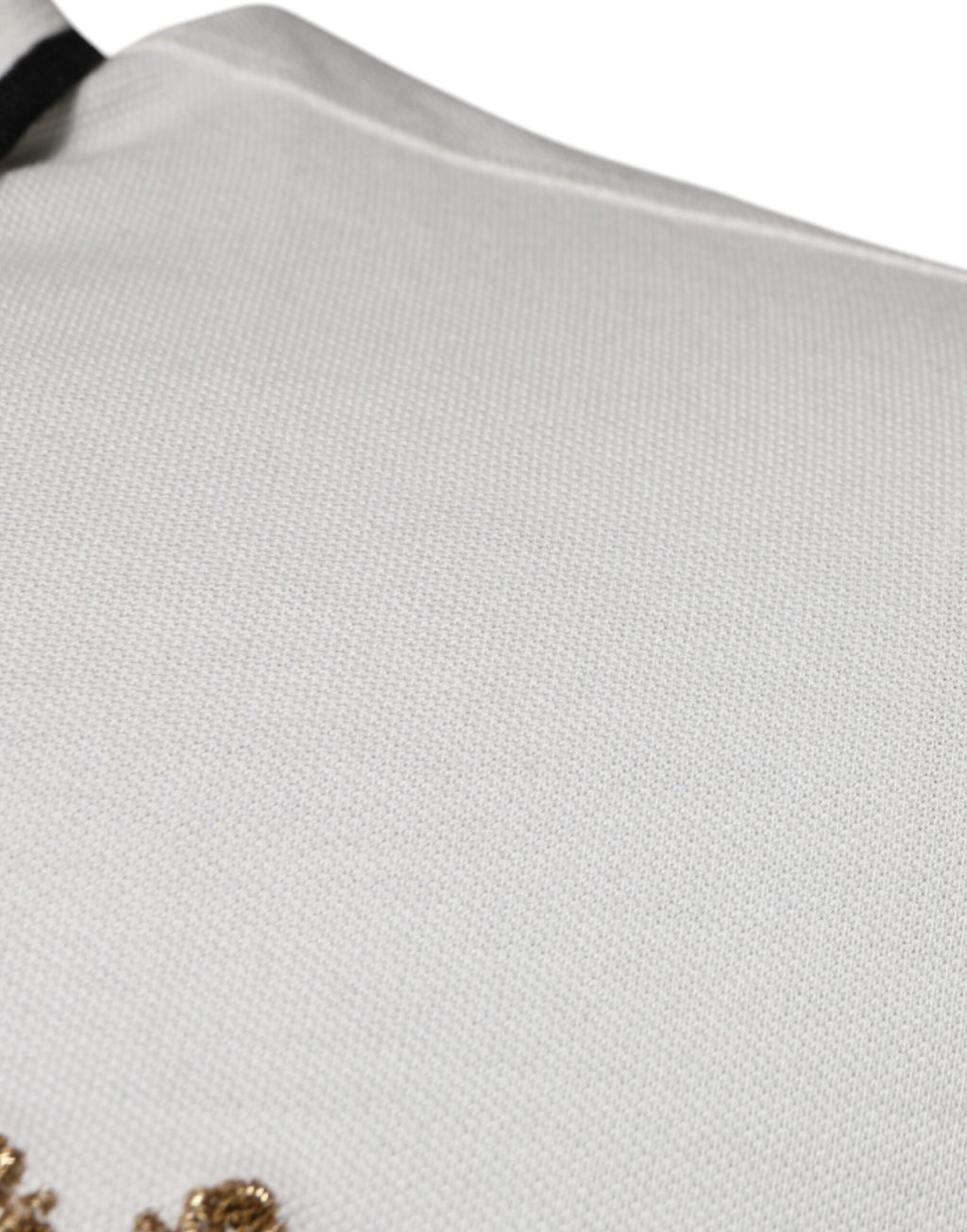 Chemise polo Dolce & Gabbana en coton blanc cassé avec col et couronne imprimés, style élégant et décontracté.