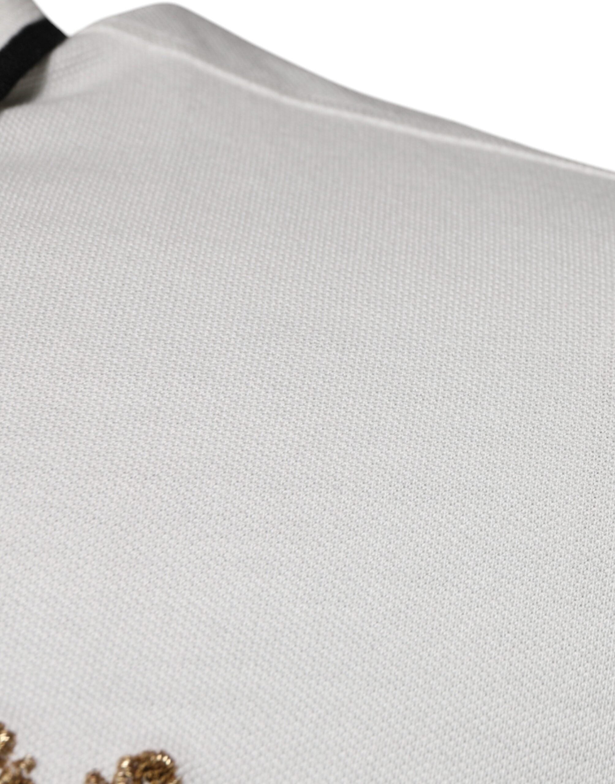 Chemise polo Dolce & Gabbana en coton blanc cassé avec col et couronne imprimés, style élégant et décontracté.
