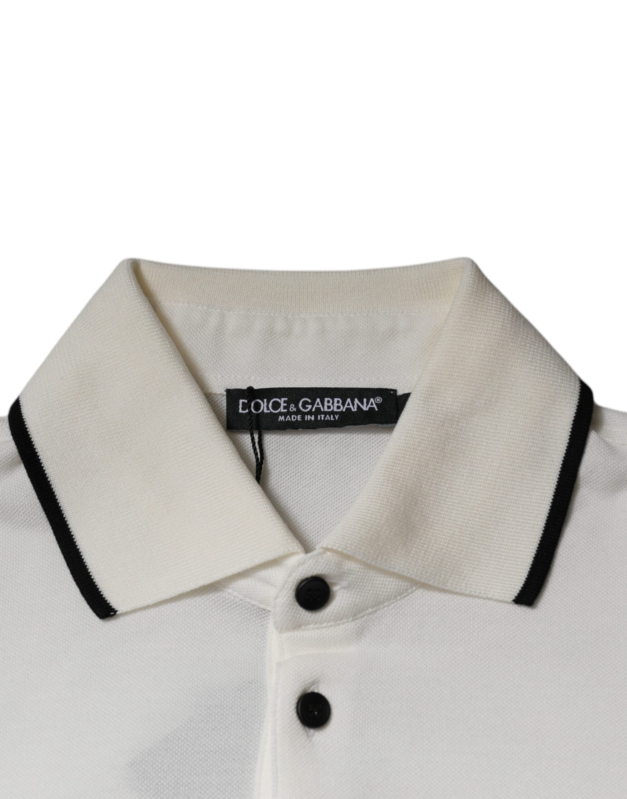 Polo blanc en coton avec col et couronne brodés, Dolce & Gabbana, style élégant et classique.