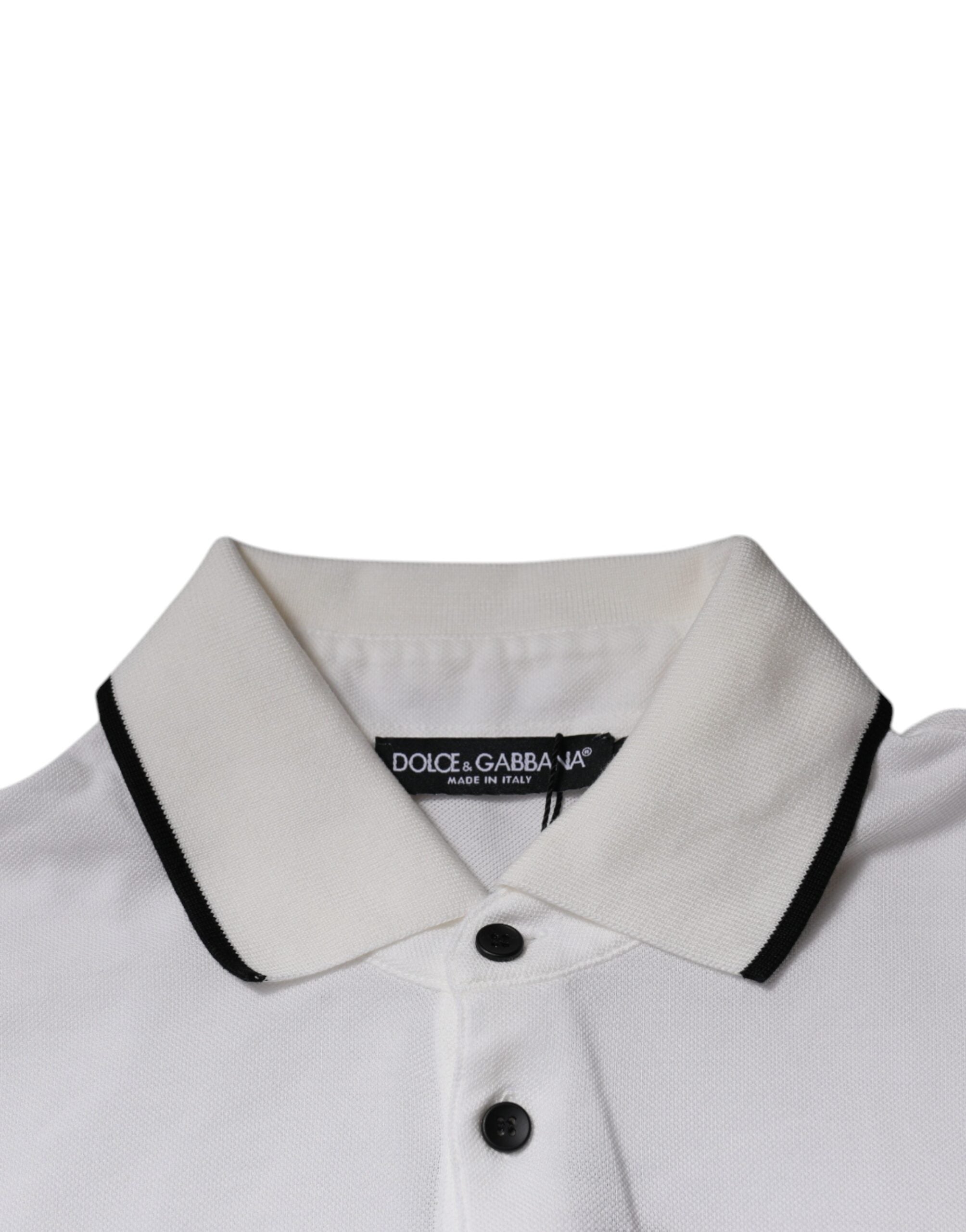 Polo en coton blanc cassé Dolce & Gabbana avec col, broderie couronne et logo visible sur le t-shirt.