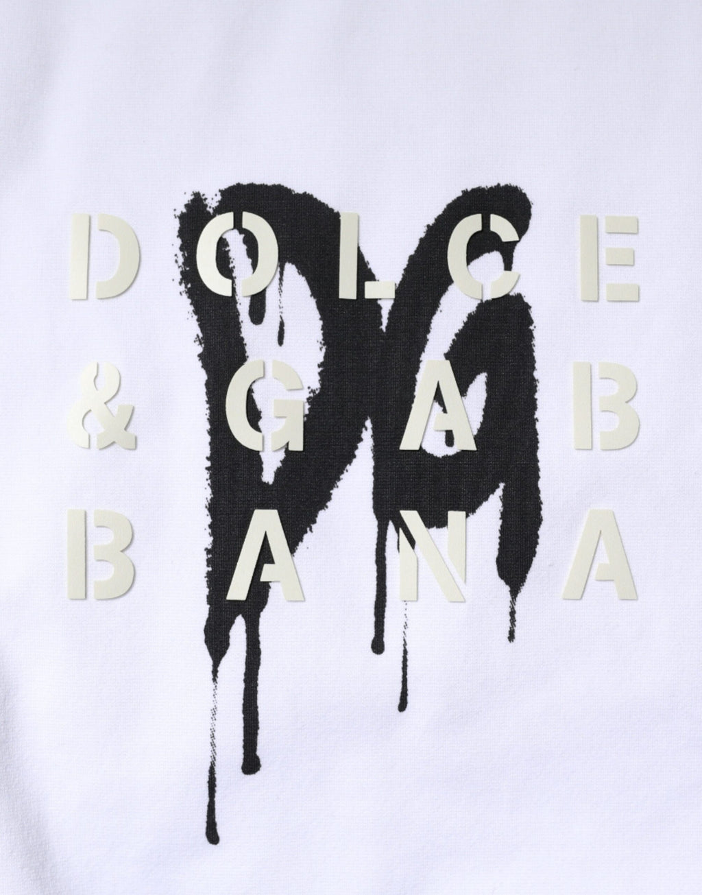 T-shirt en coton blanc Dolce & Gabbana avec logo DG, col rond, visible sur un mannequin.