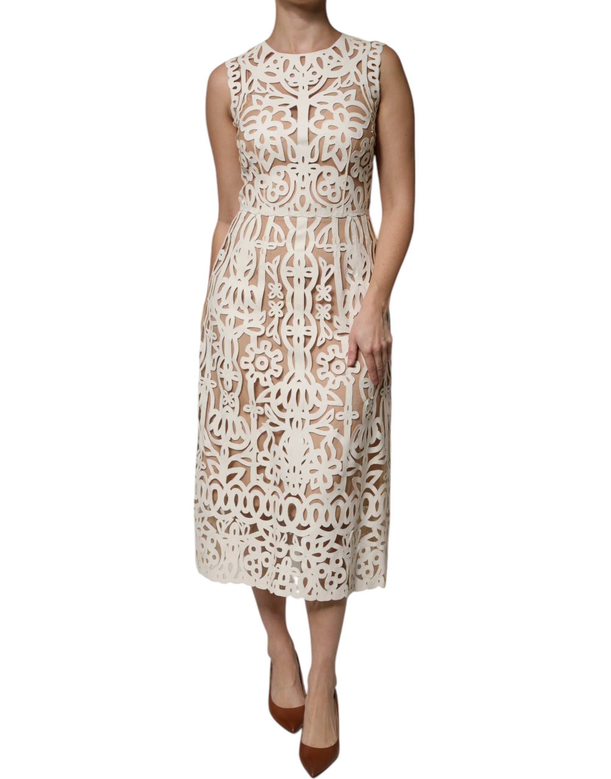 Robe midi sans manches en cuir blanc Dolce & Gabbana avec découpes, look sophistiqué et élégant.