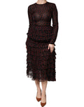Robe midi en soie noire et rouge à pois, Dolce & Gabbana, avec superpositions élégantes et style sophistiqué.