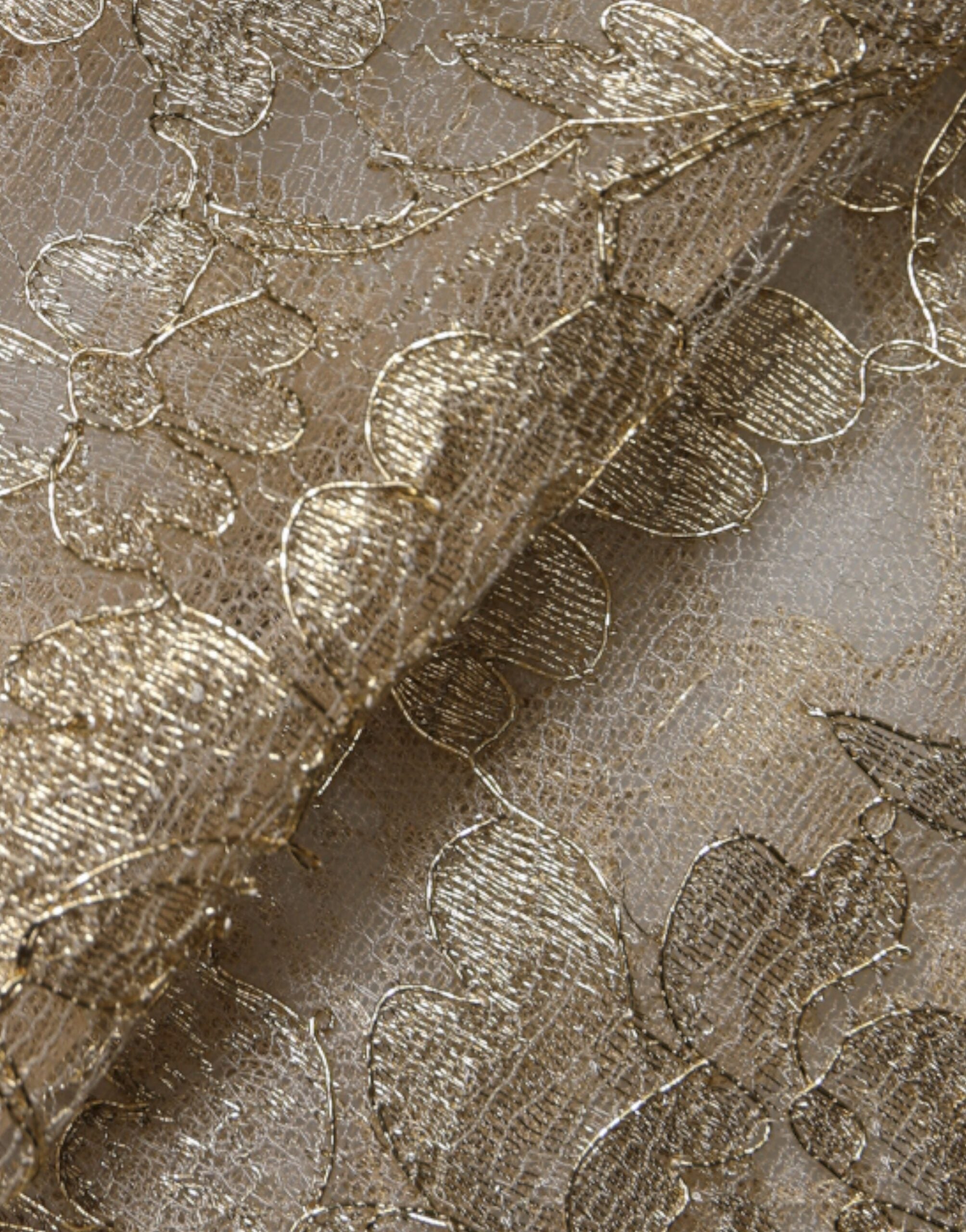 Robe courte en dentelle florale dorée de Dolce & Gabbana, coupe évasée en ligne A, élégante et sophistiquée.