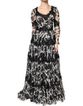 Robe maxi en soie noire Dolce & Gabbana avec broderie florale en dentelle, design élégant et raffiné.