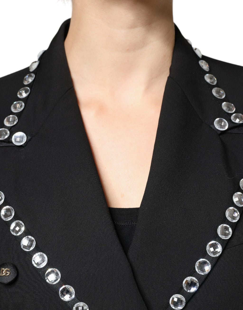 Veste blazer Dolce & Gabbana noire à double boutonnage avec cristaux, élégante et sophistiquée, vue de face sur un fond neutre.