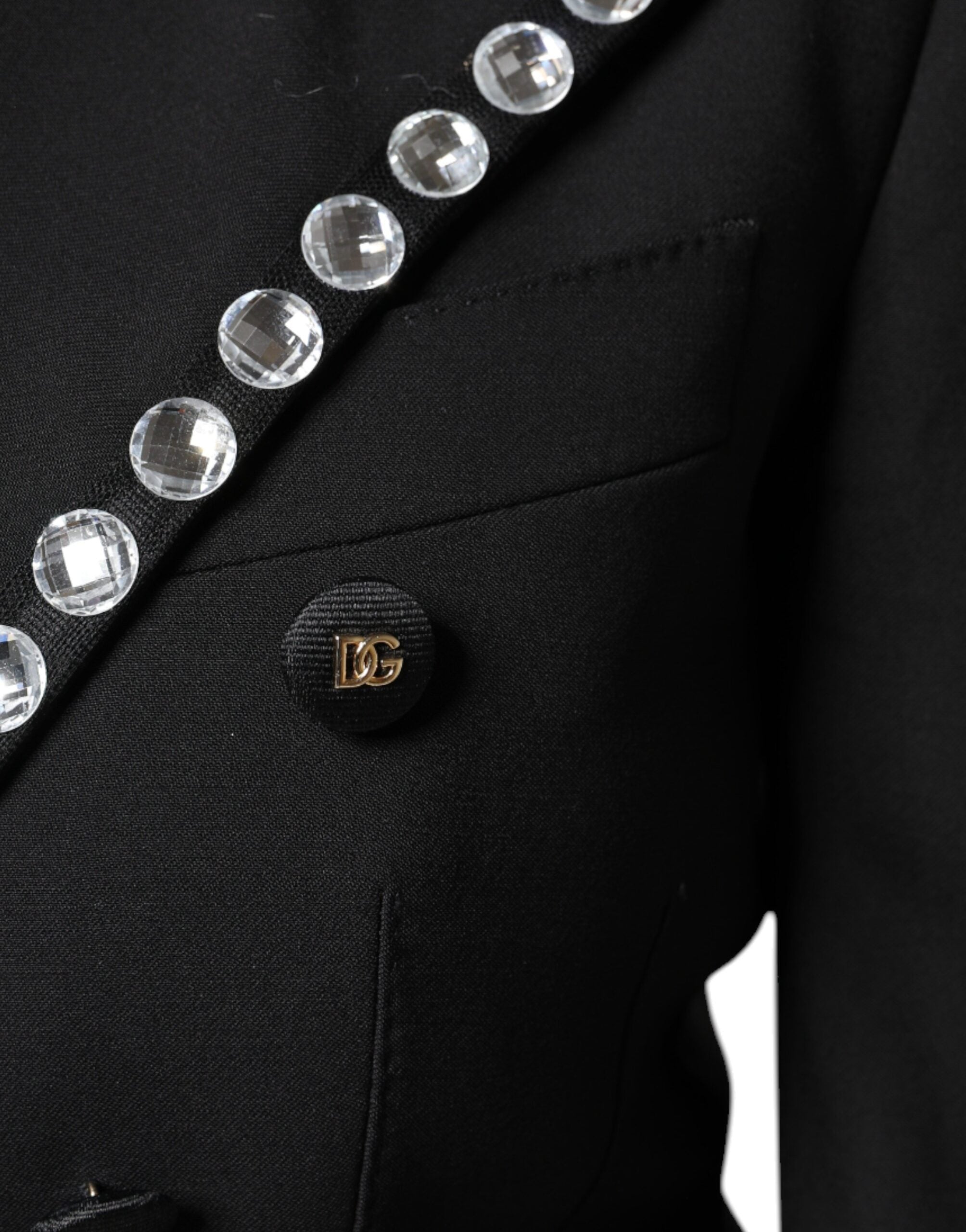 Veste blazer noire Dolce & Gabbana à double boutonnage avec cristaux, coupe élégante et détails sophistiqués.