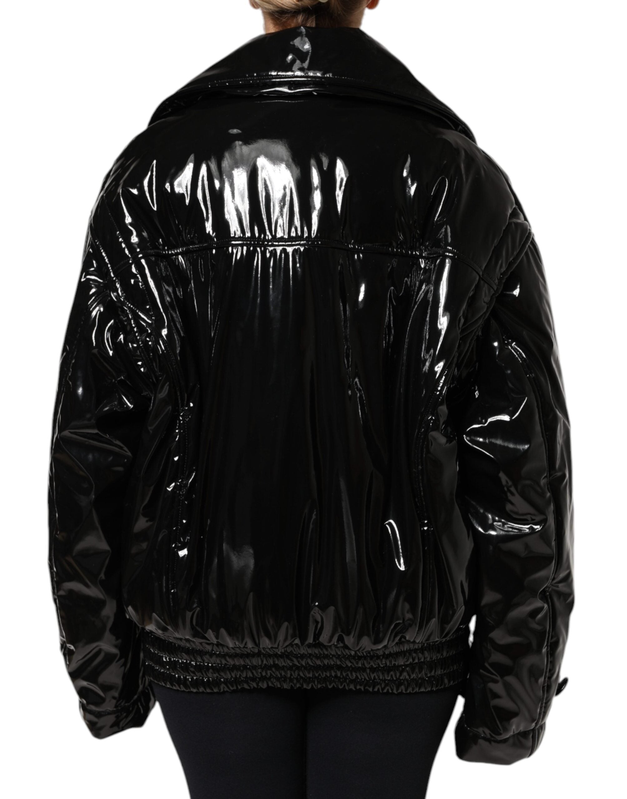 Veste blazer noire en polyester Dolce & Gabbana avec boutons, style élégant et moderne, vue de face sur un mannequin.