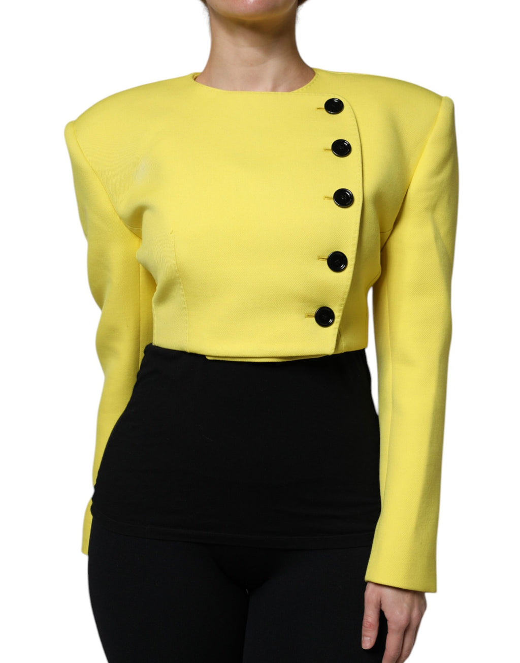 Veste courte en laine jaune citron Dolce & Gabbana avec manches longues, vue en gros plan sur le produit.
