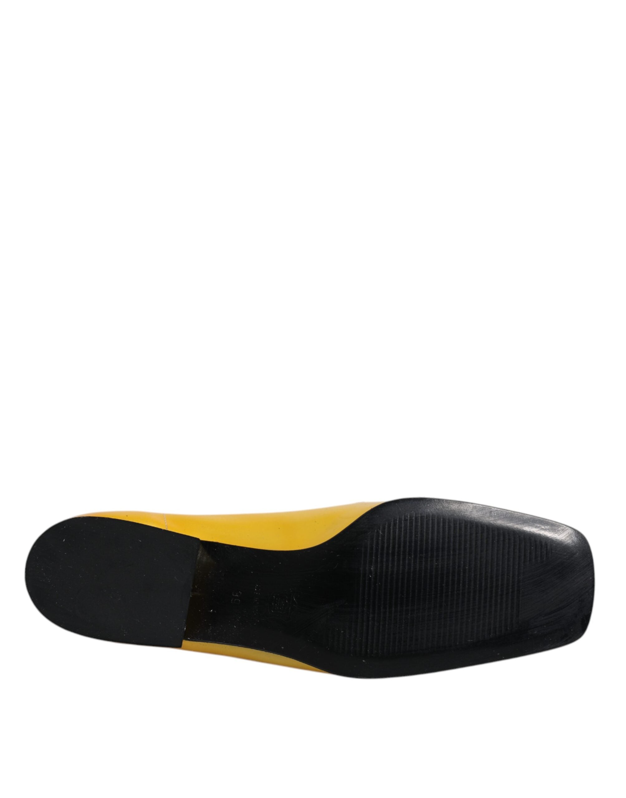 Mocassins slip-on en cuir jaune Dolce & Gabbana avec plaque logo, chaussures élégantes et confortables pour homme.