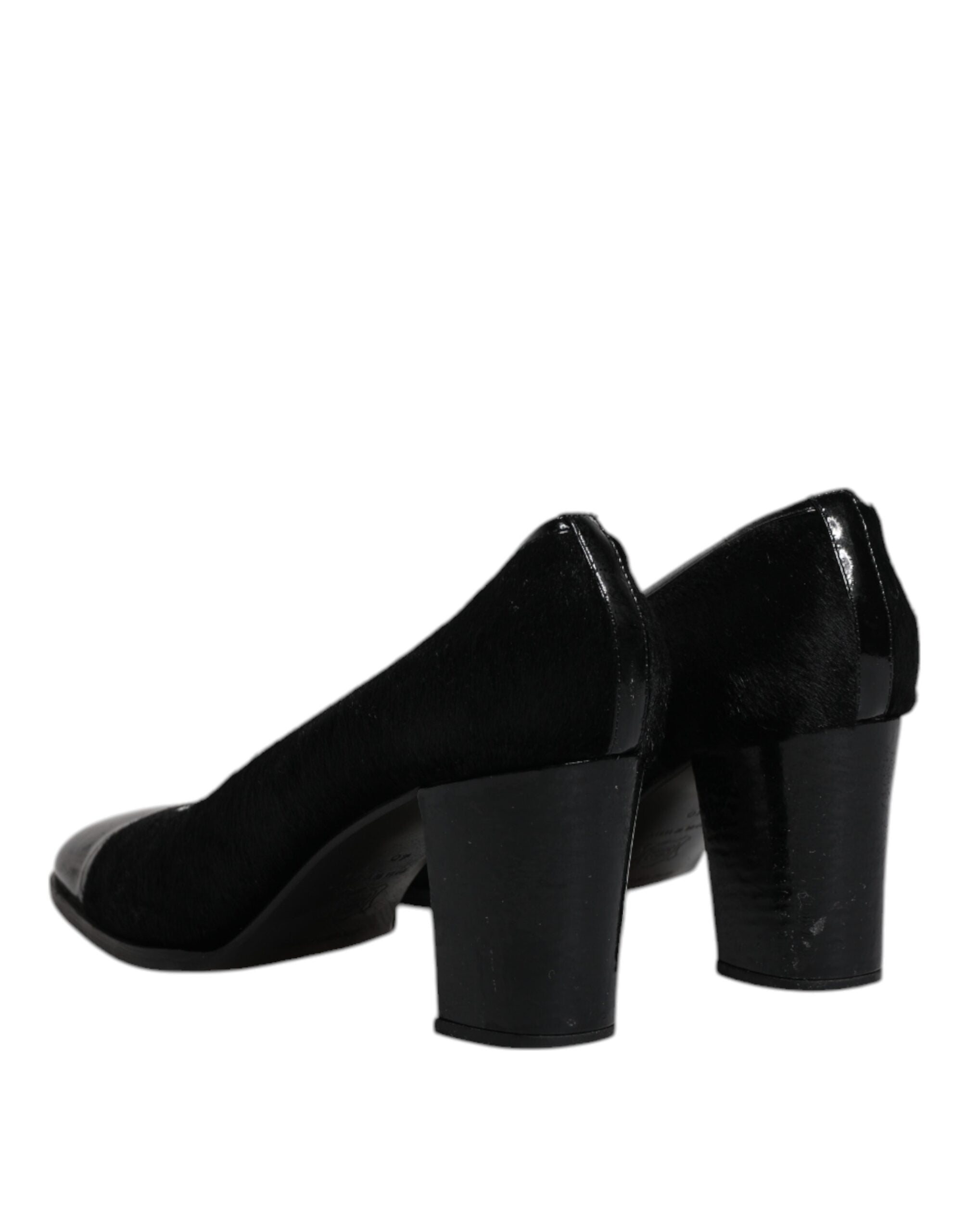 Chaussures à talons blocs en cuir noir de Dolce & Gabbana, escarpins élégants pour femmes.