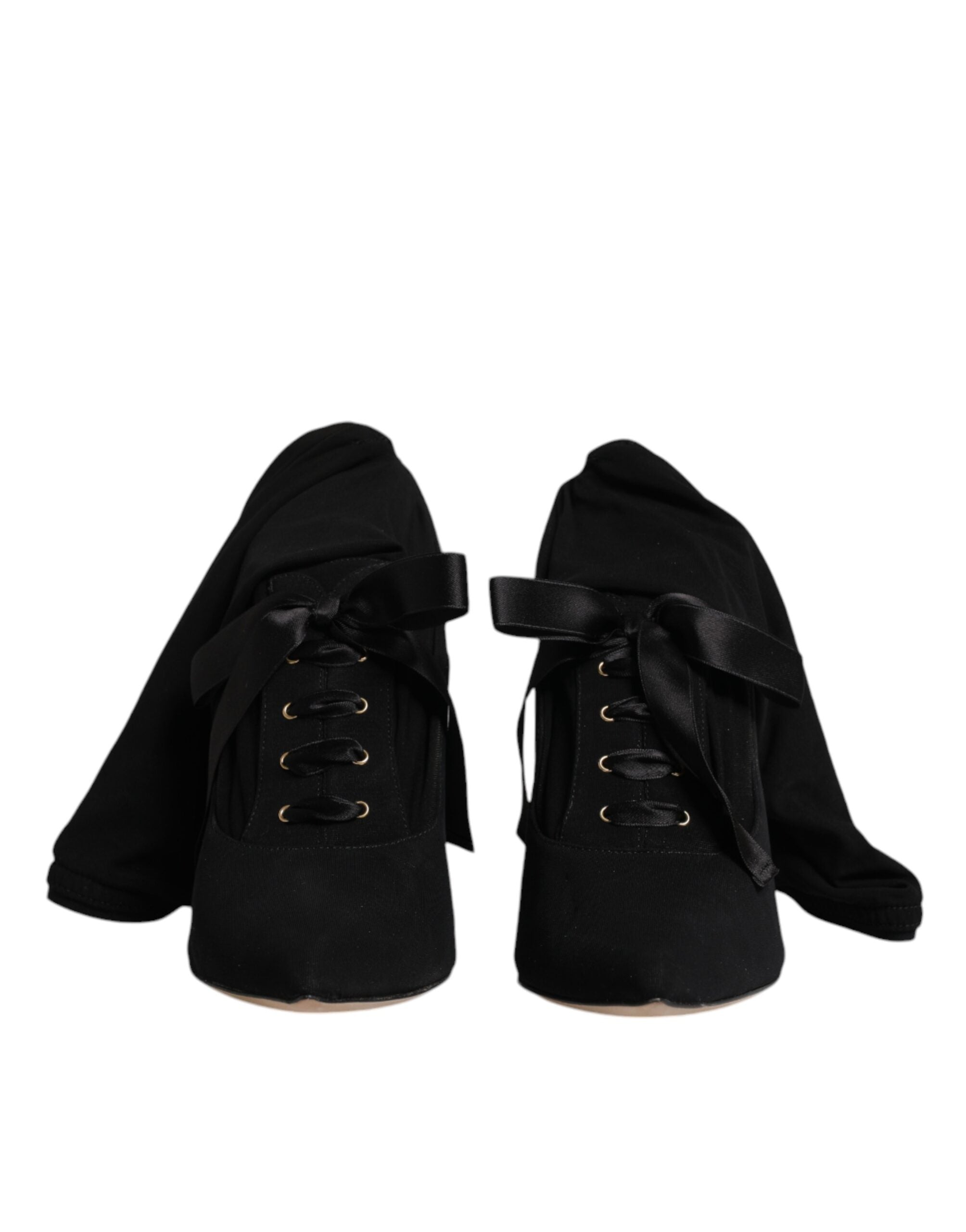 Chaussures Dolce & Gabbana talons aiguilles noires, bottines mi-mollet élégantes et sophistiquées.