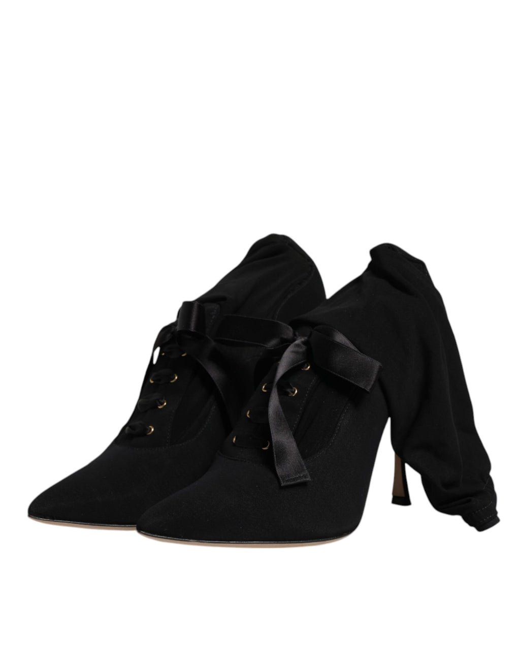 Chaussures Dolce & Gabbana, bottines noires à talons stilettos, mi-mollet, élégantes et sophistiquées, vues de côté.
