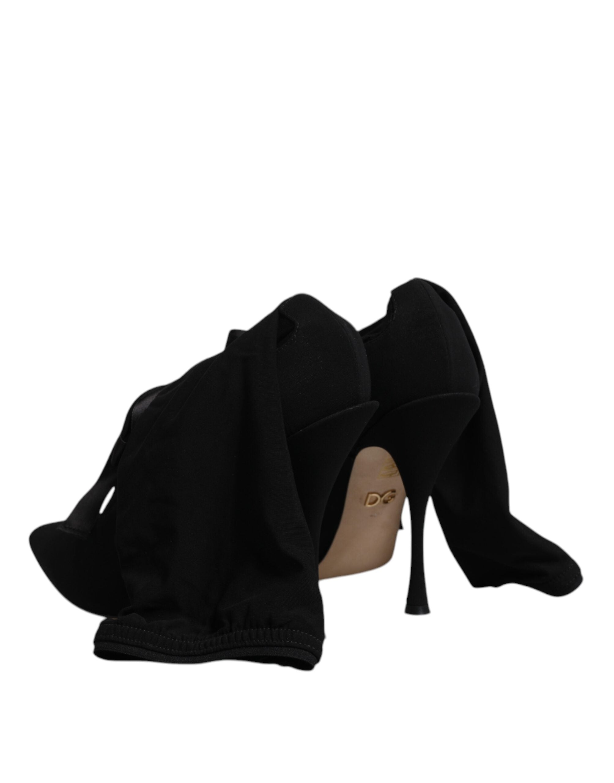 Chaussures à talons stilettos noirs Dolce & Gabbana, bottines mi-mollet élégantes en cuir, vue de face.