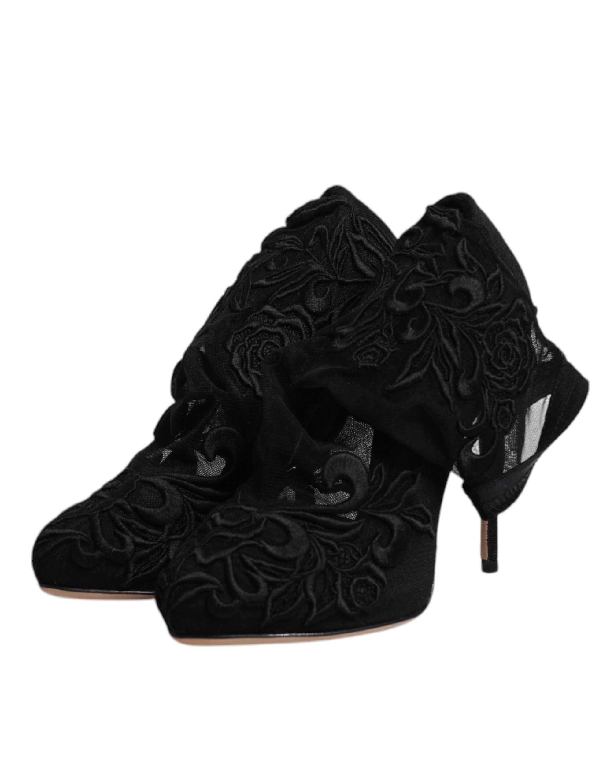 Bottes Dolce & Gabbana en tulle noir extensible, mi-mollet, avec talons pour femmes, visibles en gros plan.