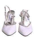 Chaussures à talons Dolce & Gabbana, slingbacks blanches ornées de strass et cristaux, élégantes et sophistiquées.