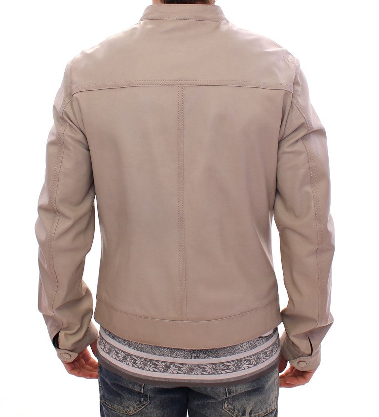 Blouson en cuir beige pour homme de la marque Dolce & Gabbana, style veste de moto avec détails en cuir.