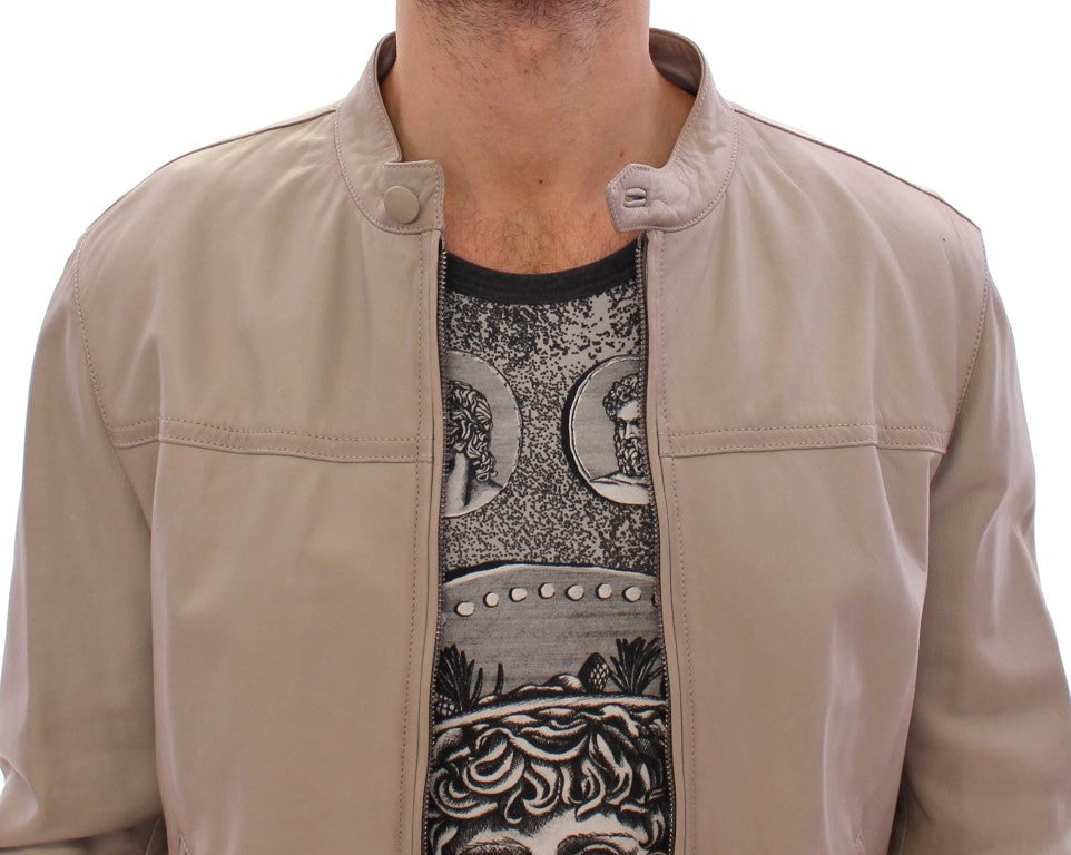 Veste en cuir beige de style biker de Dolce & Gabbana, coupe élégante et détails raffinés.
