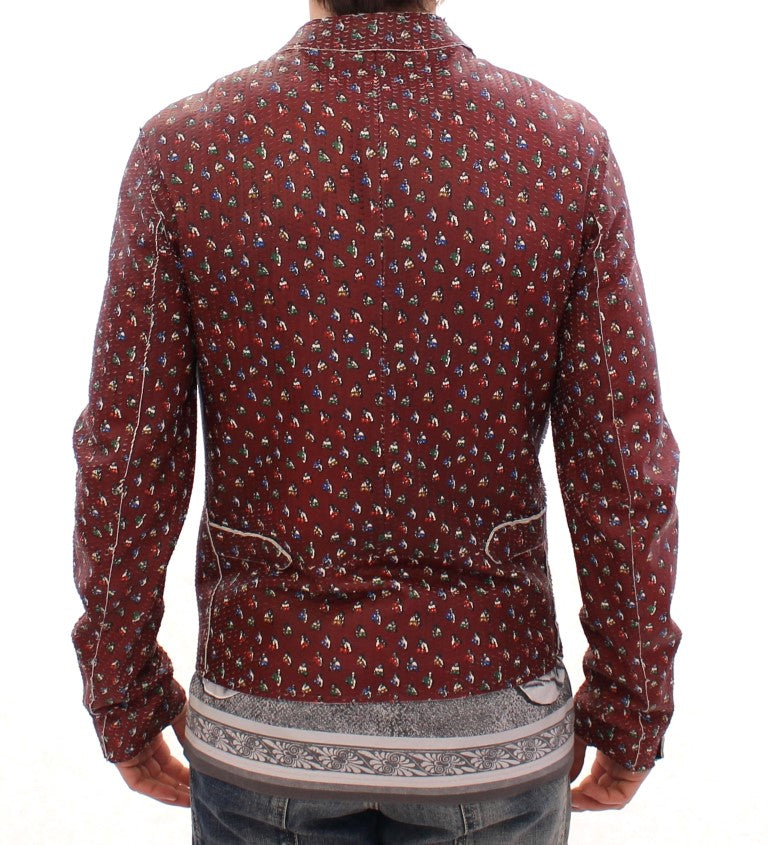 Veste Dolce & Gabbana en cuir bordeaux avec motif de boxeur, coupe élégante et détails de luxe.