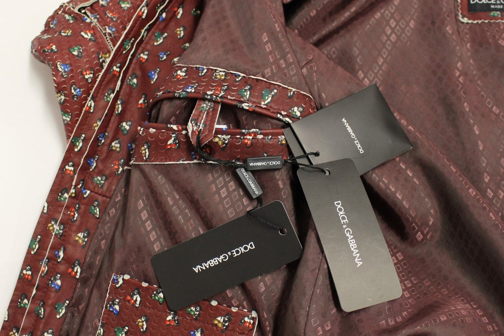 Veste en cuir bordeaux Dolce & Gabbana avec motif de boxeur, style élégant et moderne visible sur l'image.