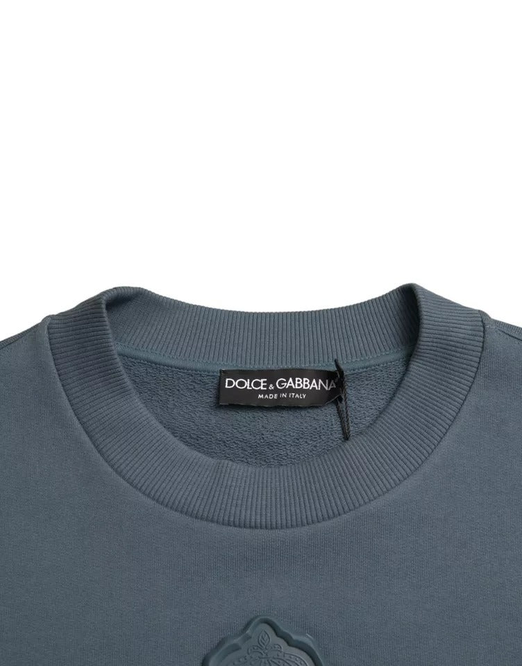 Pull à col rond pour homme Dolce & Gabbana en coton bleu avec logo brodé, style décontracté et moderne.